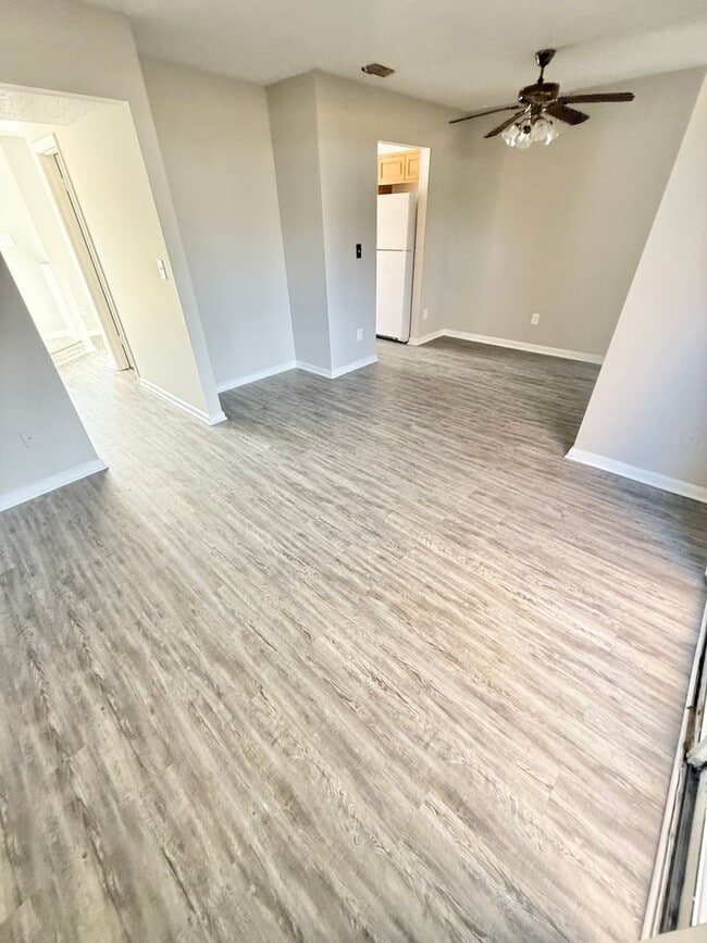 Building Photo - *** RENT READY!! Newly remodeled townhome! ALL Laminate.