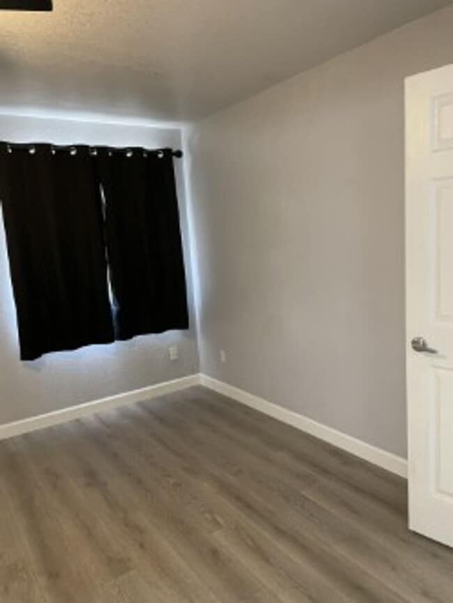 Building Photo - North side home, pet friendly with fenced back yard.