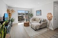 Building Photo - Immaculate 1-Bedroom Upper-Level Condo in ...