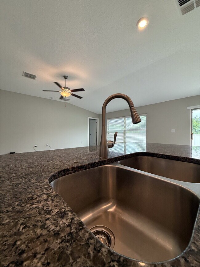 Building Photo - LIKE NEW 4-Bedroom, 2 Bath home in Triple ...