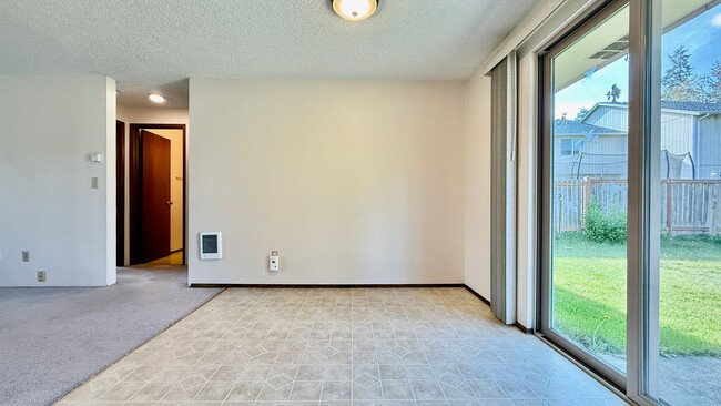 Building Photo - Two Bedroom Townhome with Yard & Attached ...