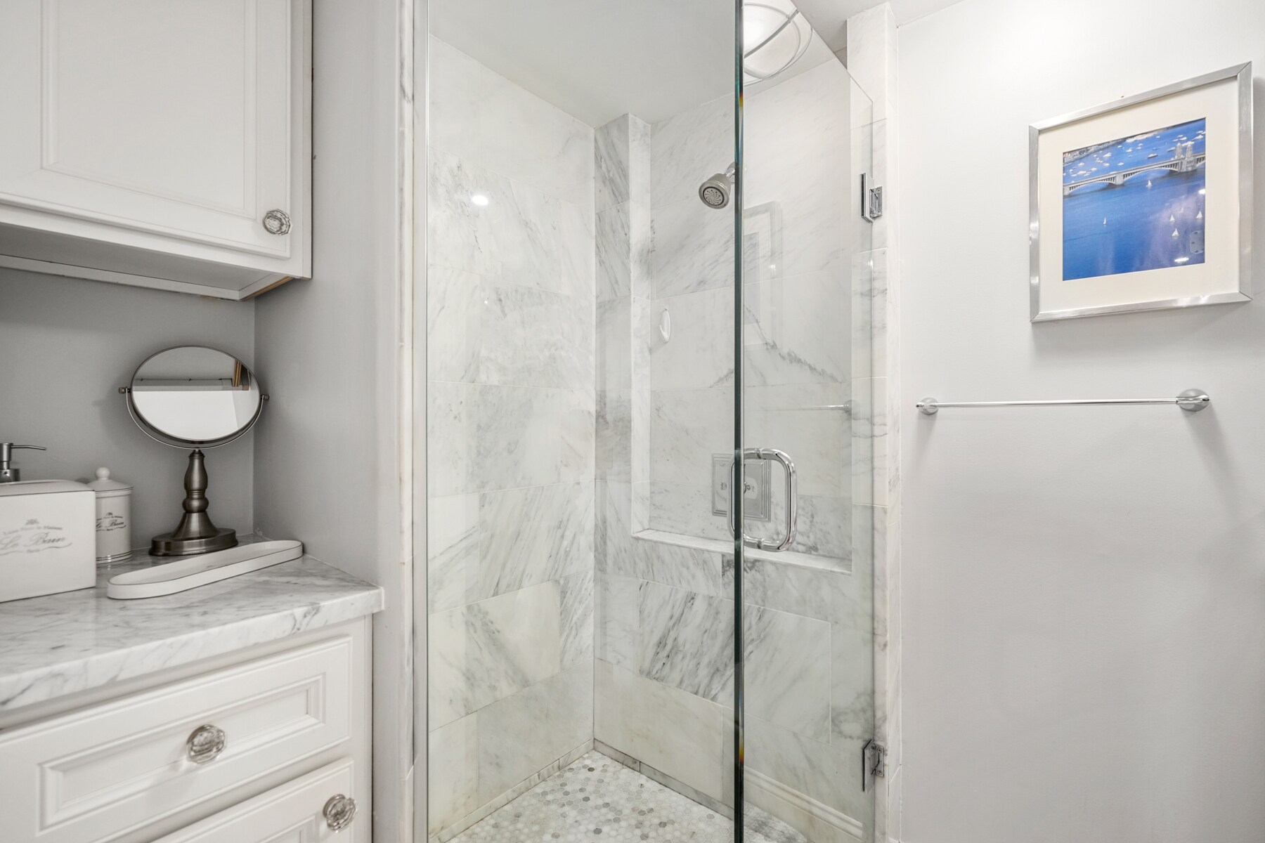 Carrara marble and plenty of bathroom storage space - 290 Commonwealth Ave