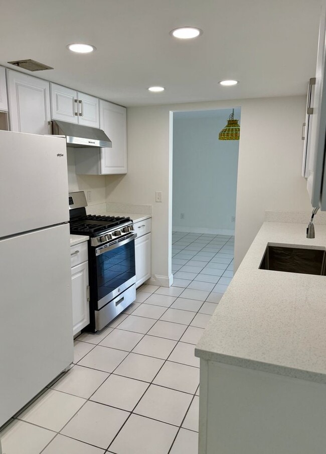 Building Photo - Beautifully Renovated 4-Bedroom Home with Large Backyard & 2-Car Garage