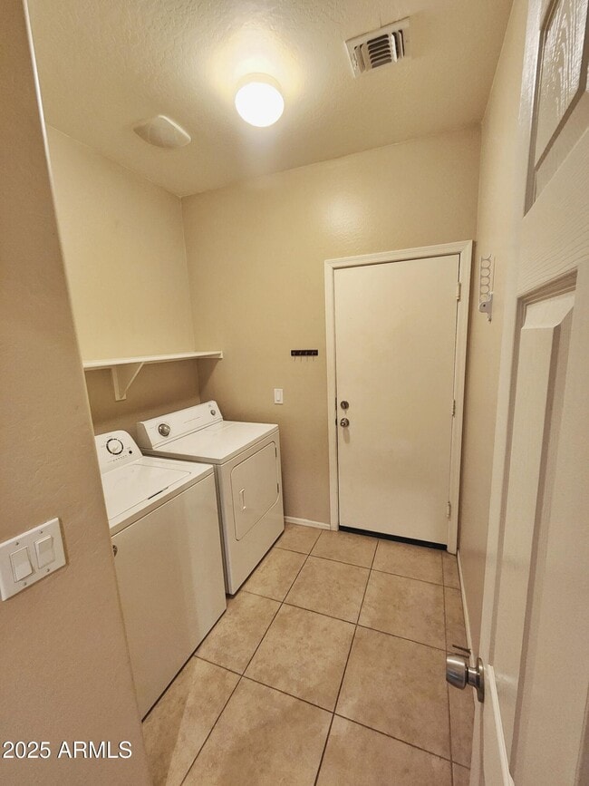 Building Photo - 18014 W Carmen Dr