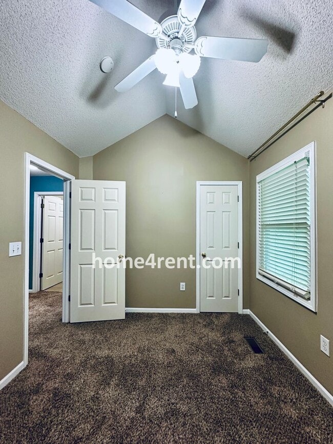 Building Photo - Blue Valley Schools w/ Wood Floors, Finished Basement and a Peaceful, Private Fenced Yard!