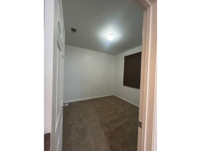Building Photo - Secure gated community new carpet and paint