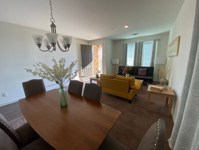 Building Photo - Welcome to the Best Deal in Town. Fully furnished 4 BD 2 BA house on a corner lot