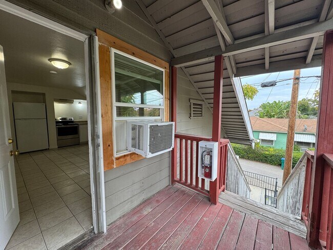 Building Photo - One Bed, One Bath Upstairs Apartment in Ce...