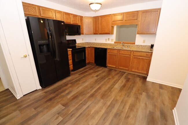 Building Photo - Discover this well-maintained 3-bedroom, 2-bath home in Indianapolis featuring an attached garage...