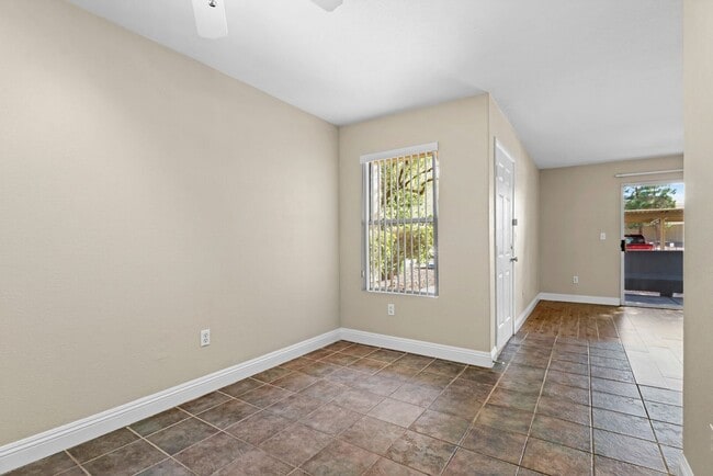 Building Photo - SE!!! Gated!! 1 Bedroom 1st Floor!! One Car Garage!!! Community Pool, Spa, Clubhouse!!! All tile ...