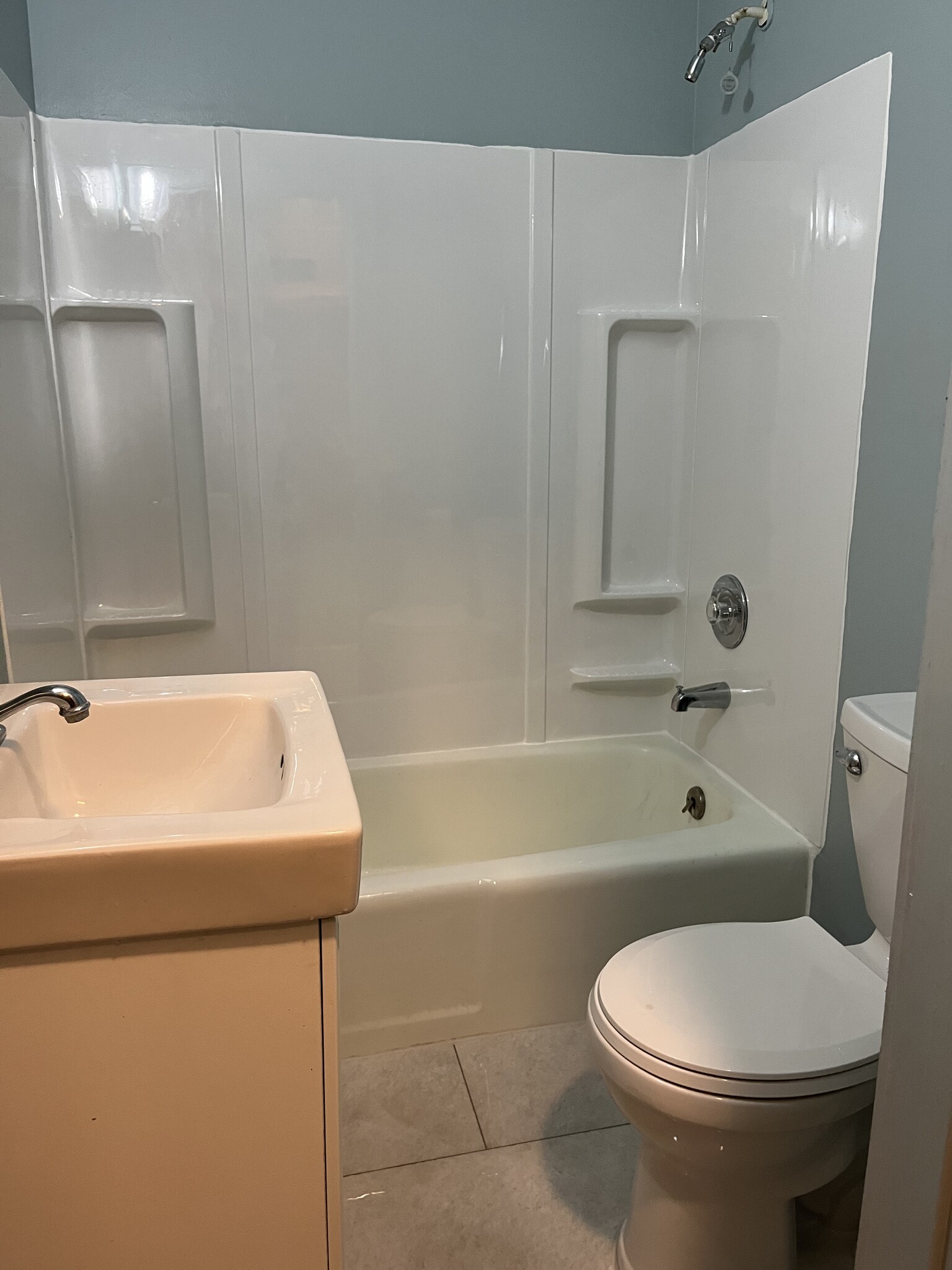 New tub surround, flooring - 1314 Williamson St