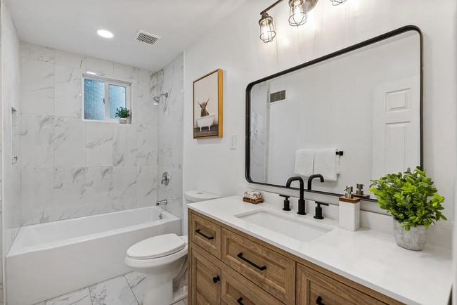 Building Photo - "Remodeled - Charming 3-Bed Sanctuary with...