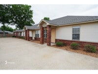 Building Photo - The Woodlands: 2BR 1 BA