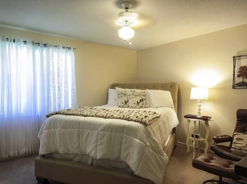 Townhome Staged Bedroom - Green Ridge Apartments