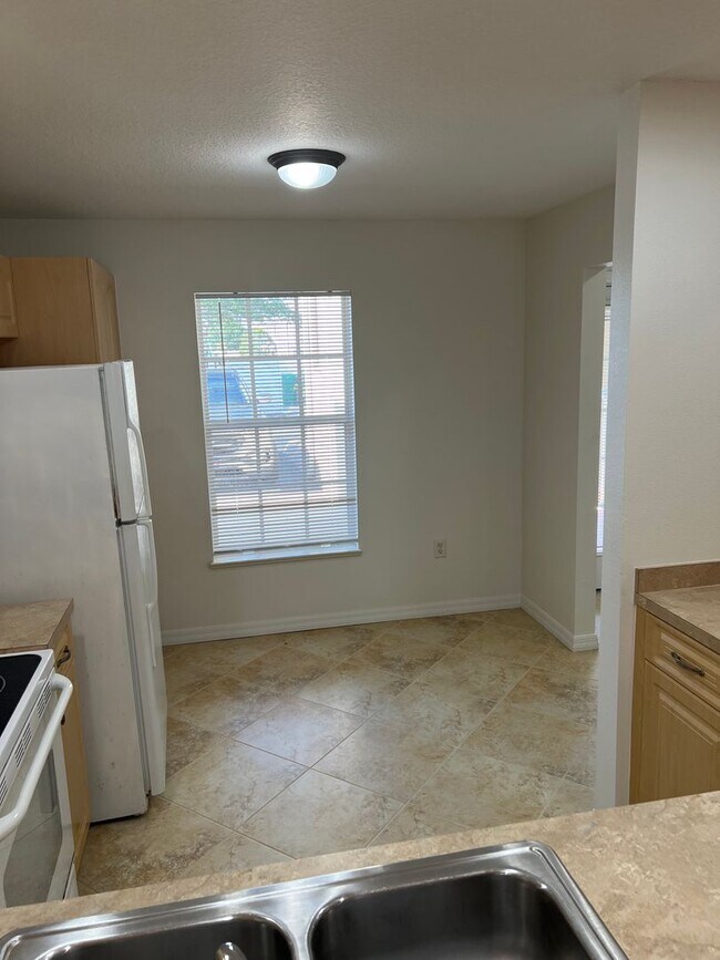 Building Photo - The Porches of Deep Creek Punta Gorda