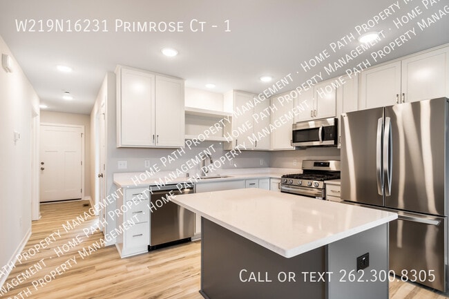 Building Photo - W219N16231 Primrose Ct