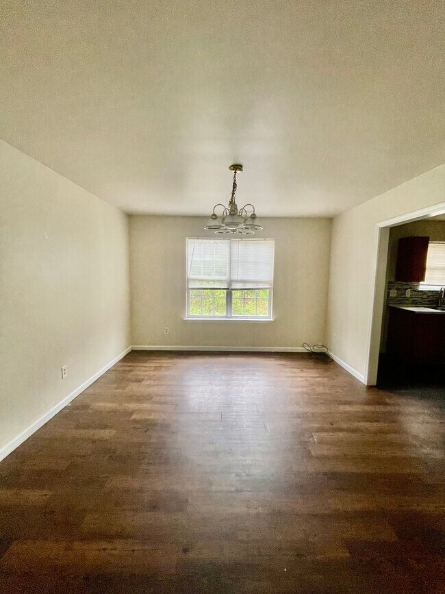 Building Photo - Must see 4 bedroom 2.5 bath townhouse with 1 car garage .
