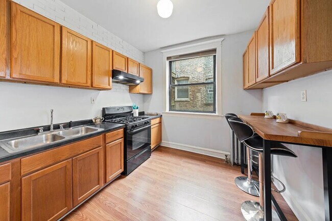 Building Photo - Premium Unit with Modern Upgrades