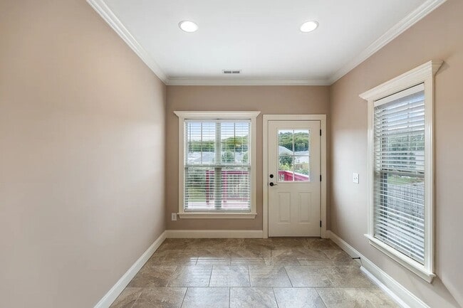 Building Photo - GORGEOUS FOURPLEX HOME - END UNIT