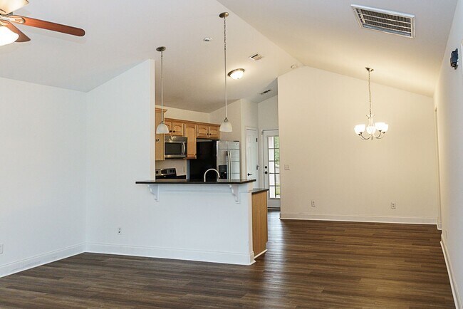 Building Photo - Three Bedroom House with Gated Backyard