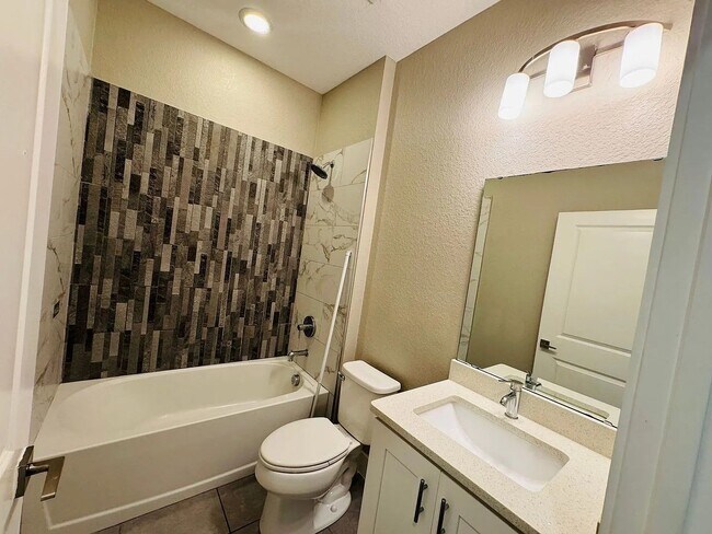 Building Photo - Beautiful New 3-Bedroom Home with Spacious Layout & 2-Car Garage in Poinciana Villages