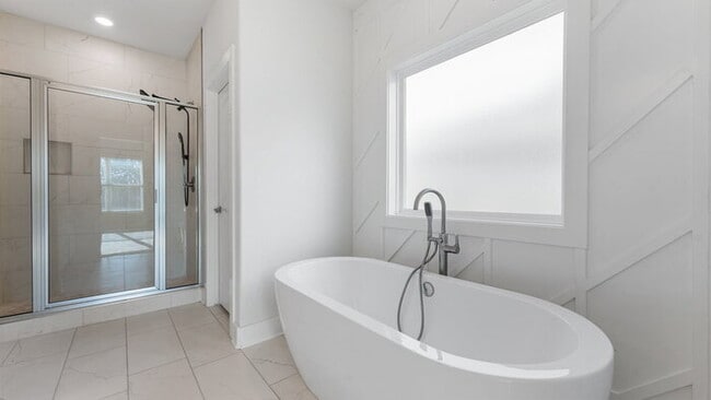 Building Photo - "Lovely 4-Bedroom Retreat with Fireplace &...
