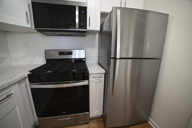 Building Photo - Newly remodeled studio in a gated building with pool and laundry room!