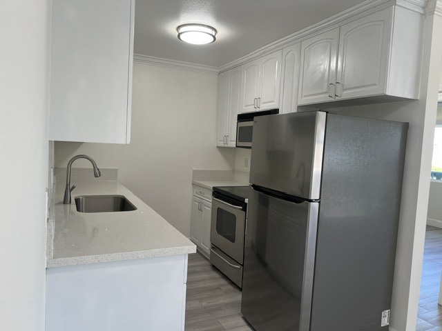 Includes new refrigerator - 676 Seacoast Dr