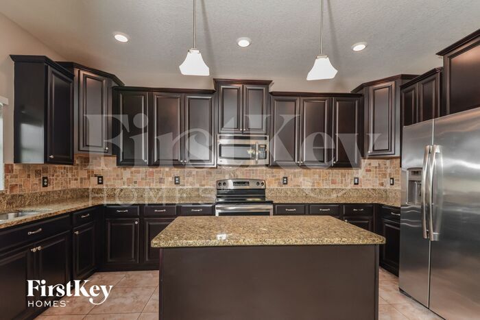 Building Photo - 16609 Magnolia Reserve Pl