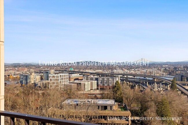 Building Photo - Downtown Condo with Stunning Views and Mod...