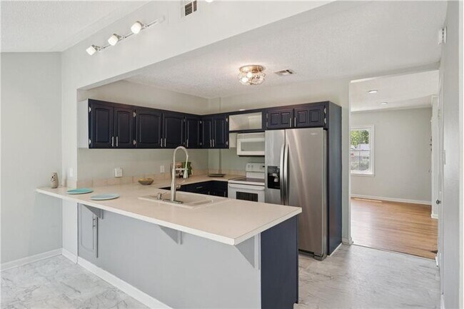 Building Photo - 1417 S Quebec Ave