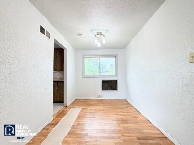 Building Photo - Charming Tacoma Home with Huge Fenced Yard, Garage & Hardwood Floors
