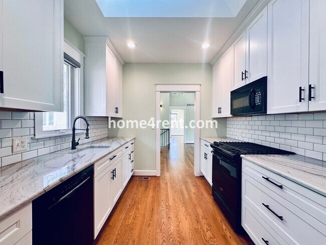 Building Photo - Charming Home Near Country Club Plaza w/ Gorgeous Updates, Wood Floors and a Two Car Garage!