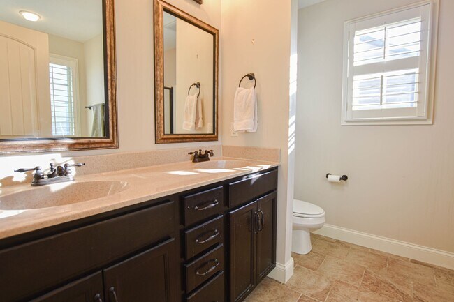 Building Photo - Pet Friendly Three Bedroom with Bonus!