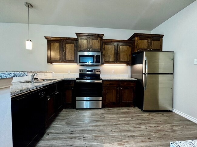 Building Photo - 4 Private Suites • Walk to Texas Tech • Modern Finishes