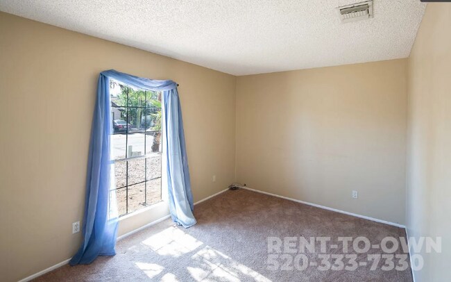 Building Photo - 8661 N Newhill Ave