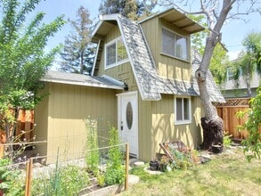 Building Photo - Stand Alone Cottage, Updated Kitchen, Fresh Paint, Wood Floors, Skylight, Loft Bedroom, Utilities...