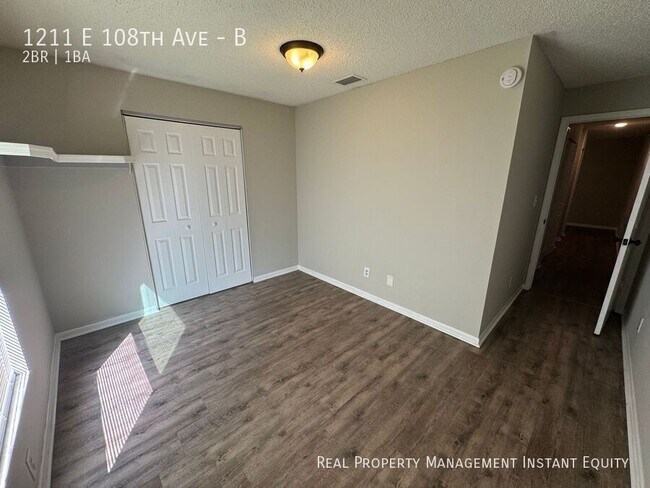 Building Photo - 1211 E 108th Ave