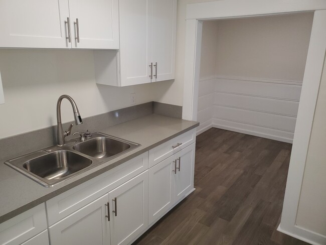 Galley style kitchen with newer fixtures - 9343 Lomita Dr