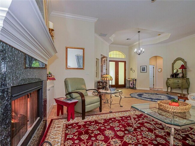 Building Photo - 5873 Pine Ridge Cir