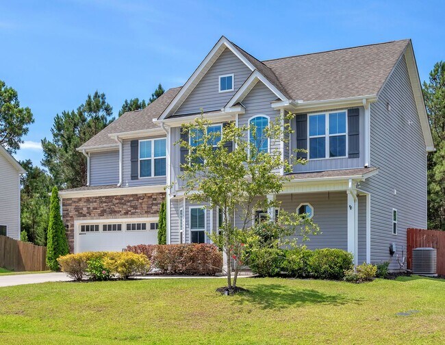 Building Photo - 4 bedroom 2.5 bathroom home close to beaches, shopping, and Marine Corps Bases.