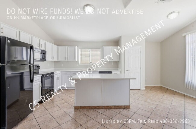Building Photo - 10921 W Granada Rd