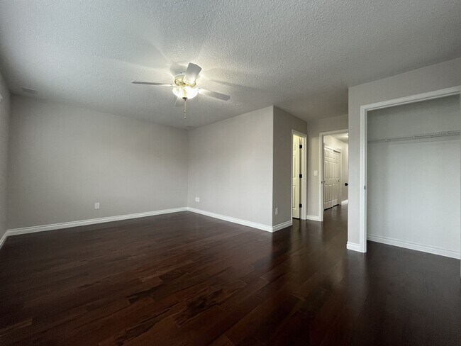 Building Photo - Grand 5 Bedroom Home Featuring 19ft Ceilings, Family Room & Main-Level Suite