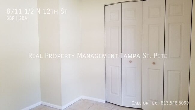 Building Photo - 8711 1/2 N 12th St-