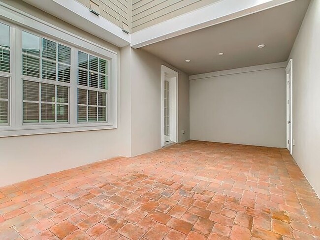 Building Photo - New Luxury Townhome in Celebration, FL Corner unit. All porcelain tiled floors. Aleutian model by...