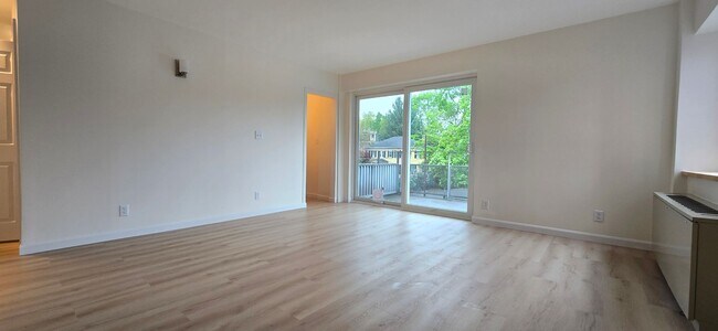 Building Photo - Everything is new! Harvard Sq! Walk to T! Large 1bd with balcony! Parking included!