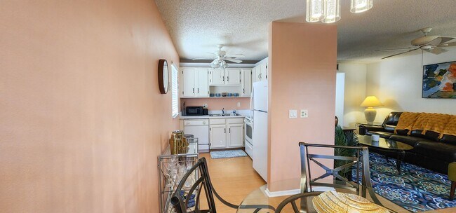 Building Photo - Coming Soon! Beautifully furnished 1 bedroom 1.5 bath condo