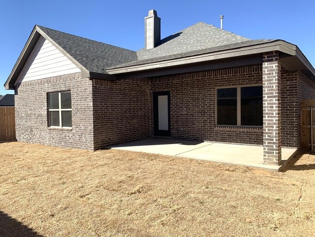 Building Photo - 1018 N Genoa Ave