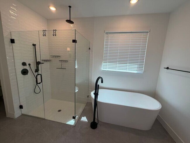 Building Photo - Move-in ready and like-new! Washer, dryer, and refrigerator Included.