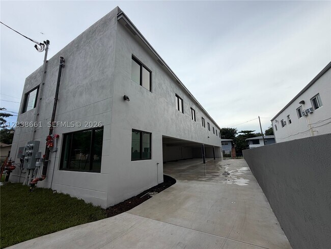 Building Photo - 6480 NE 1st Pl